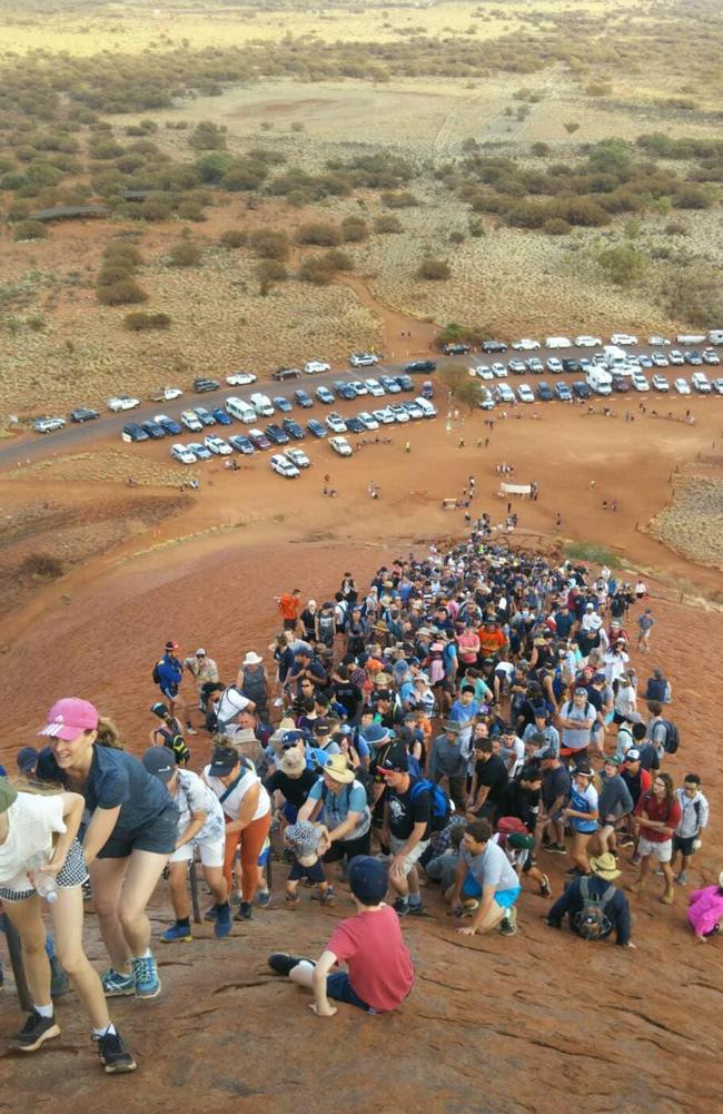 People have flocked to climb the landmark before the practice is banned. Picture: Supplied