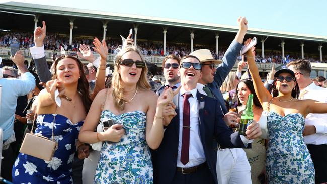 Racegoers celebrate during at The Everest at Randwick on Saturday. Picture: Jeremy Ng/Getty Images