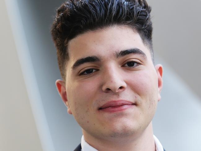 Drew Pavlou outside Brisbane Magistrates Court in Brisbane CBD on Friday, November 22, 2019. The university student has accused Dr Xu Jie of inciting death threats and assaults by allegedly publicly labelling him an anti-China separatist. (AAP Image/Claudia Baxter)