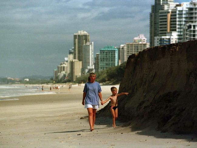 1998: Tania and Brandon (5 yrs) James from Melbourne, walking past a section of erosion at Narrow Neck.