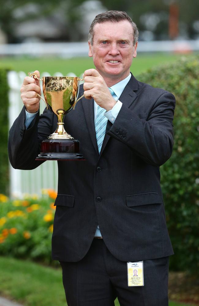 Trainer David Vandyke with the Ipswich Cup trophy. Picture: Liam Kidston