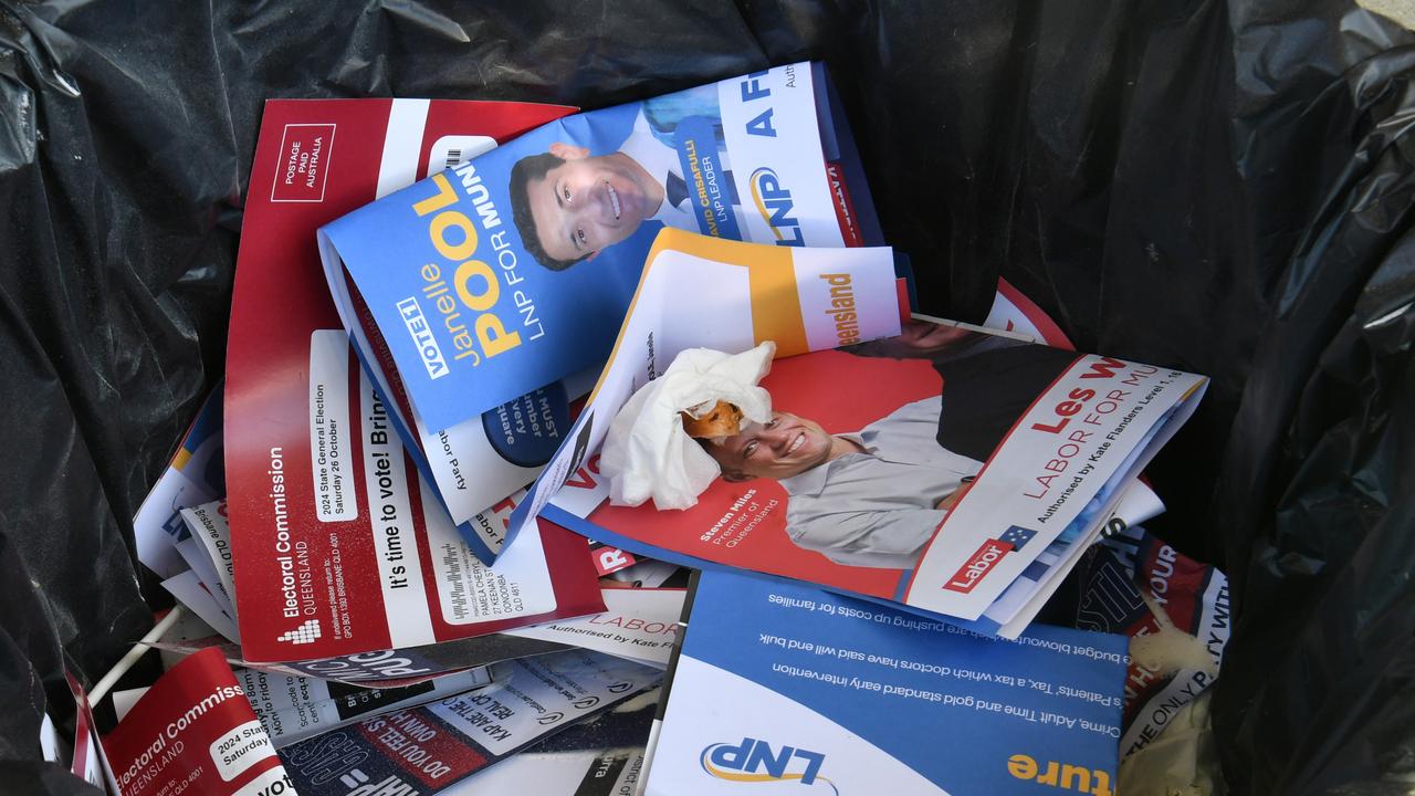 How to vote cards pile up in a bin at a Townsville polling booth. Picture: Evan Morgan