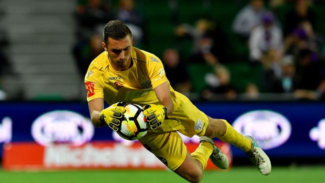 Former Adelaide United keeper Daniel Margush of Adelaide makes a save against Perth Glory in 2018 in Perth. (Photo by Stefan Gosatti/Getty Images)