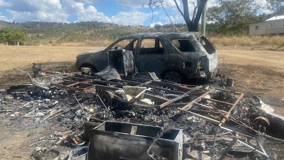 A Laidley man had been charged over his alleged involvement in a fire that destroyed a caravan and car.