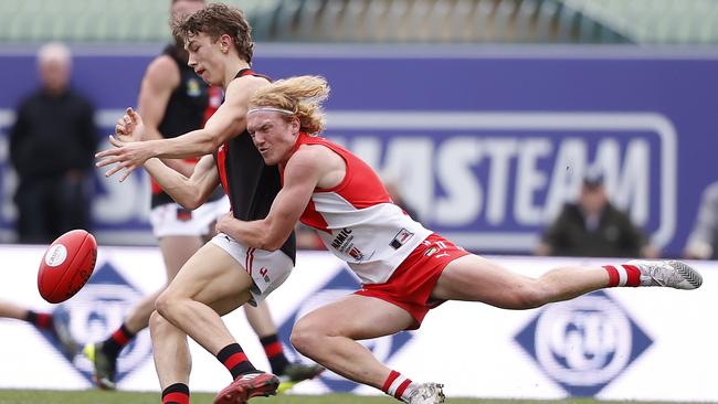 North Launceston's Michael Stingel is tackled by Clarence's Ethan Jackson in their round three TSL clash. Picture: Zak Simmonds