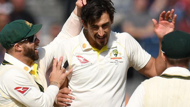 Mitchell Starc was back on the money and back in the wickets on day four at Old Trafford.