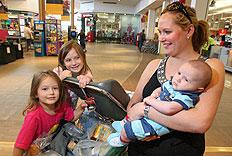 Linda Petrlic shopping in Melbourne with children Montana, 5, Mikayla, 4, and Noah, 9 months. Picture: David Geraghty