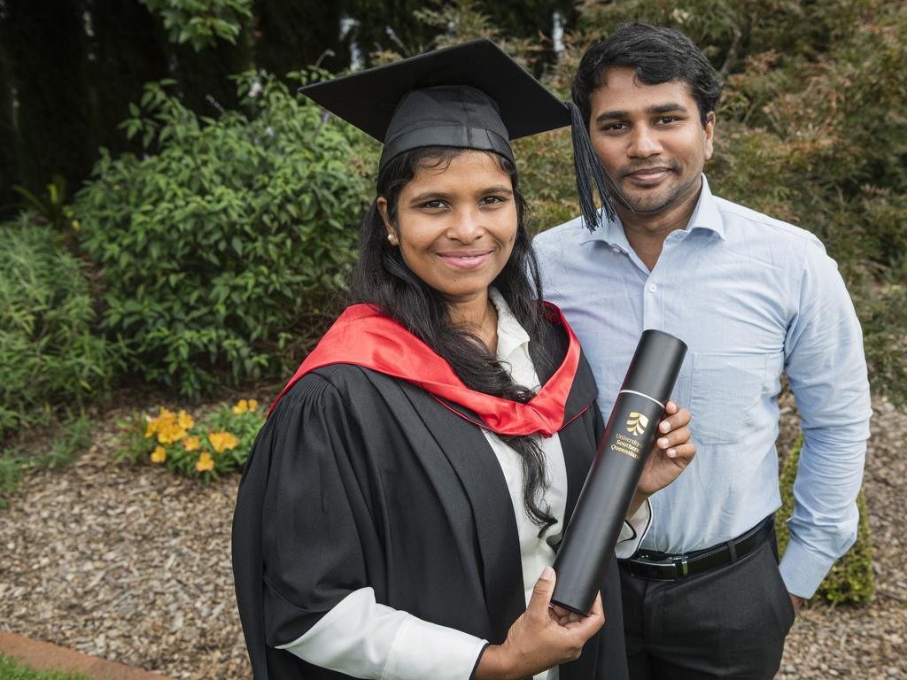 Master of Cyber Security graduate Upeksha Dona is congratulated by Dhinuth Silva at a UniSQ graduation ceremony at Empire Theatres, Tuesday, February 13, 2024. Picture: Kevin Farmer