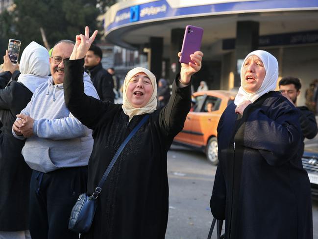 Syrians celebrate in the central city of Homs. Picture: Aref Tammawi / AFP