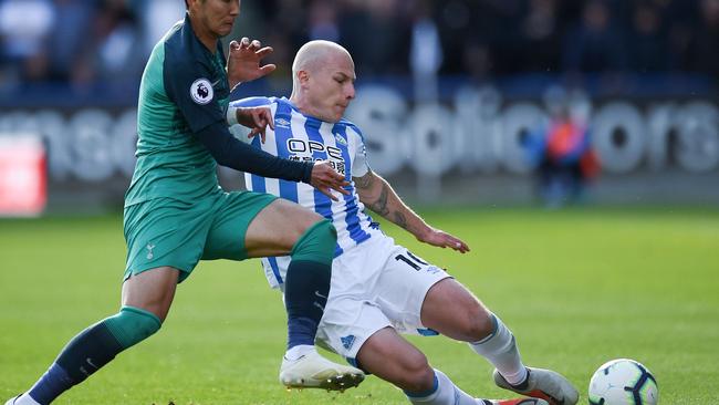 Australian midfielder Aaron Mooy in action for Huddersfield Town