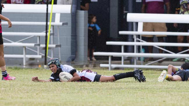 Jemmika Dahlsthom scores a try for Bradley Dahlstrom Memorial after an intercept against ATSiCHS – Sister Girls. Picture: Kevin Farmer