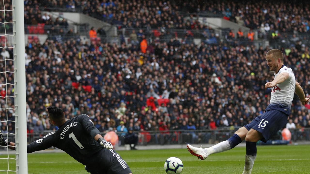 Eric Dier (R) slots home for Spurs from close range.  (Photo by Adrian DENNIS / AFP)