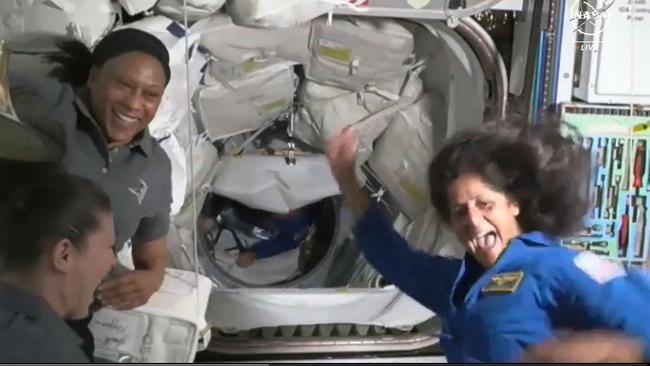 Astronauts Sunita Williams (R) and Butch Wilmore (C) boarding the International Space Station after the docking of the Boeing Starliner. Picture: NASA