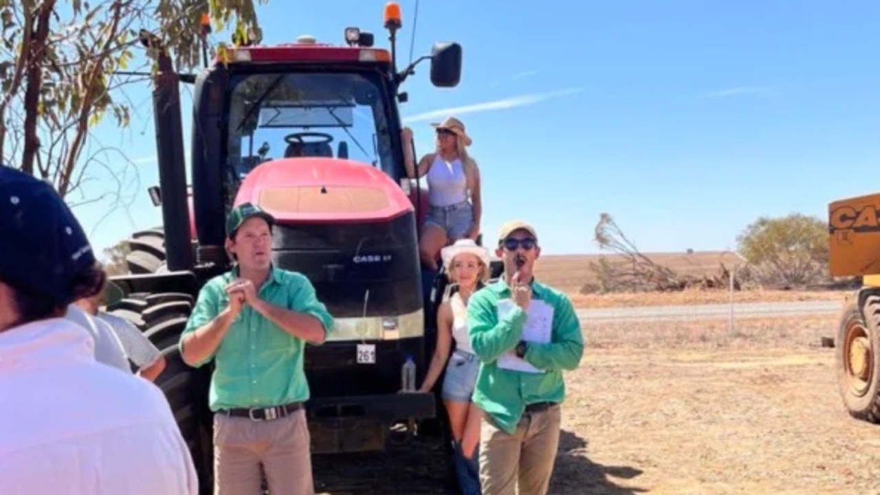 Two skimpies hired to help sell farming machinery at local auction have sparked outrage among WA's agricultural community. Picture: Supplied/X