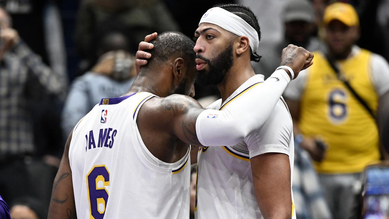 WASHINGTON, DC - DECEMBER 04: Anthony Davis #3 and LeBron James #6 of the Los Angeles Lakers celebrate after a 130-119 victory against the Washington Wizards at Capital One Arena on December 04, 2022 in Washington, DC. NOTE TO USER: User expressly acknowledges and agrees that, by downloading and or using this photograph, User is consenting to the terms and conditions of the Getty Images License Agreement. (Photo by Greg Fiume/Getty Images)
