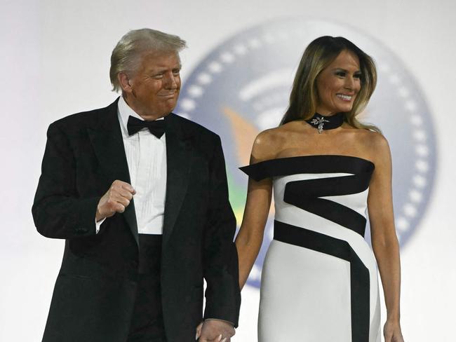 US President Donald Trump and First Lady Melania Trump arrive for the Commander-In-Chief inaugural ball at the Walter E. Washington Convention Center in Washington, DC, on January 20, 2025. (Photo by Jim WATSON / AFP)