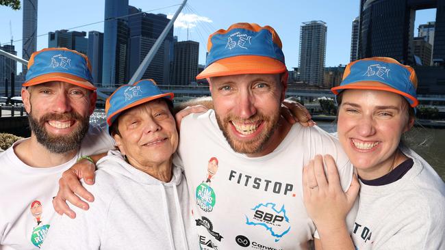 Tim Franklin welcomed home by his brother Sean, mum Roslyn and sister Cara. Picture: Liam Kidston