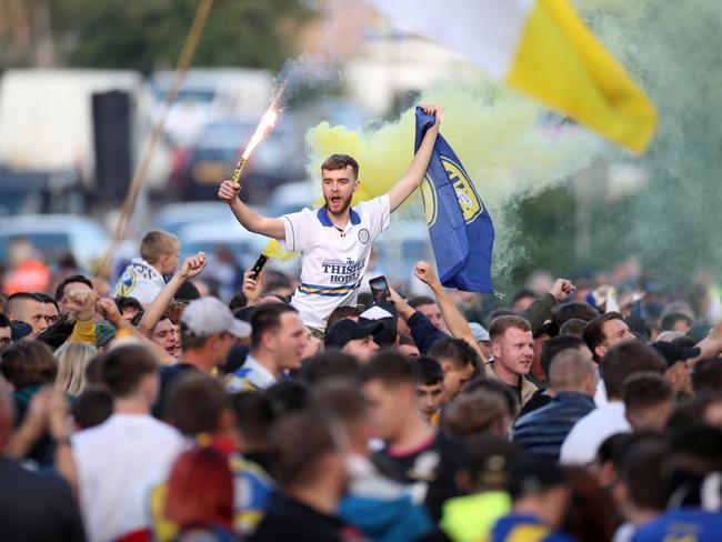 Leeds fans outside Elland Road celebrate the club winning the Sky Bet Championship. (Photo by Danny Lawson/PA Images via Getty Images)