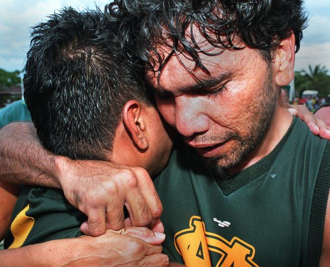 Brian Stanislaus (right) celebrates St Marys 2013 premiership win with Cyril Rioli Jr. Picture: Michael Marschall