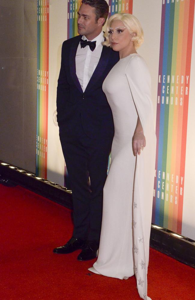 Stunning pair ... Taylor Kinney and Lady Gaga. Picture: Kris Connor/Getty Images