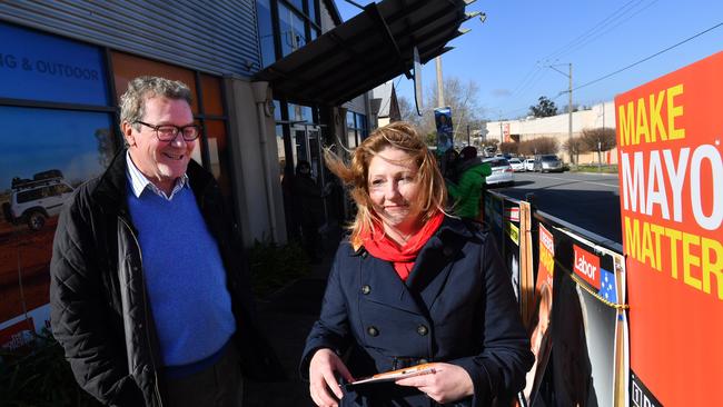 Centre Alliance candidate Rebekha Sharkie and Alexander Downer seen campaigning at a pre-poll booth in Mt Barker on Tuesday. AAP Image/David Mariuz