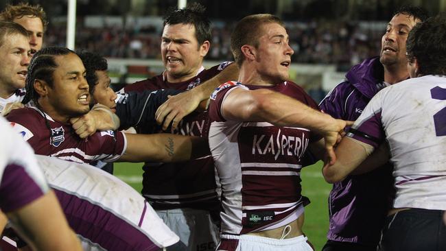 Players from the Storm and Sea Eagles during a brawl in  the 2011 battle of Brookvale. Picture: Mark Kolbe/Getty Images.