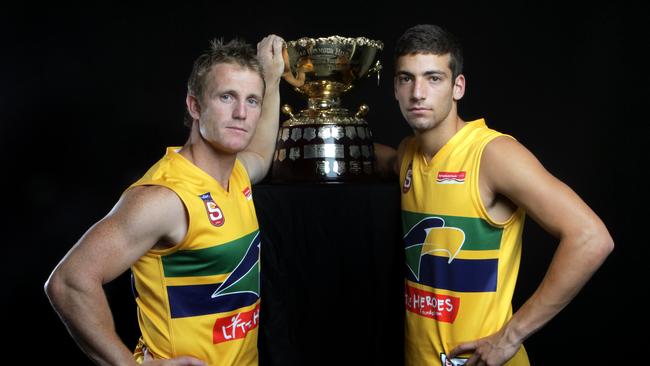 Jimmy Toumpas and Justin Cicolella and Jimmy Toumpas with the Thomas Seymour Hill Trophy ahead of the 2011 SANFL grand final.