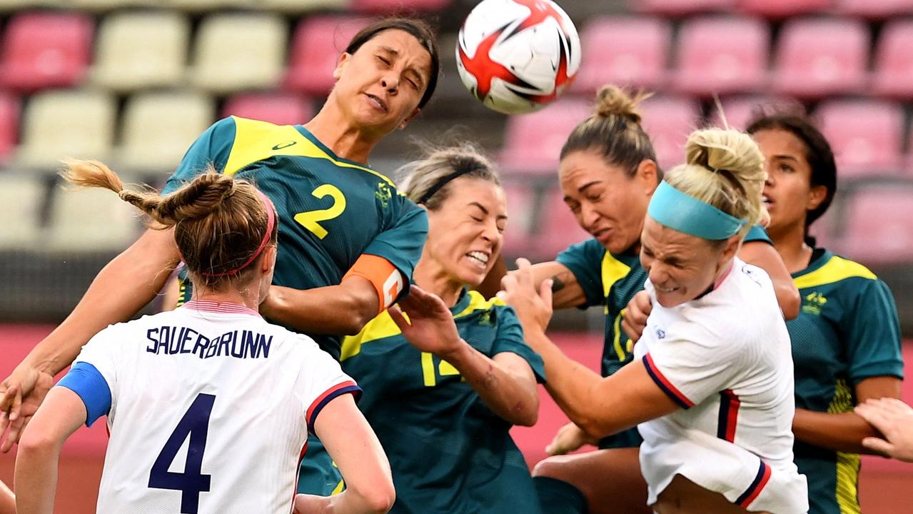 Sam Kerr attempts to head one home in the Matildas clash with USA. Picture: AFP