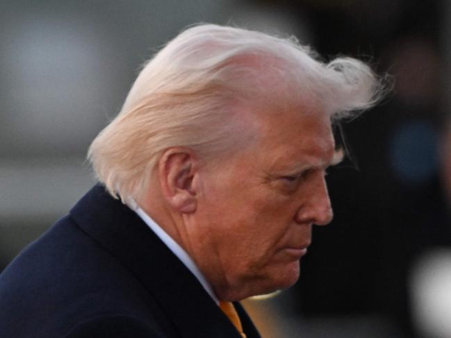 US President Donald Trump walks to board Air Force One at Joint Base Andrews in Maryland on March 7, 2025. Trump is traveling to his Mar-a-Lago resort in Florida. (Photo by ROBERTO SCHMIDT / AFP)