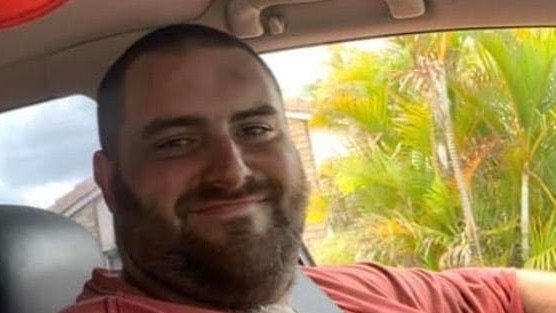 Aaron Young died after being hit by a hired Isuzu truck while loading a car on to a trailer in a quiet Beenleigh street, days after his 30th birthday in May 2020.