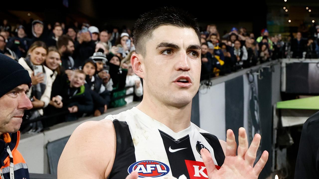 MELBOURNE, AUSTRALIA - AUGUST 25: Brayden Maynard (left) and Darcy Moore of the Magpies celebrate during the 2023 AFL Round 24 match between the Essendon Bombers and the Collingwood Magpies at Melbourne Cricket Ground on August 25, 2023 in Melbourne, Australia. (Photo by Michael Willson/AFL Photos via Getty Images)