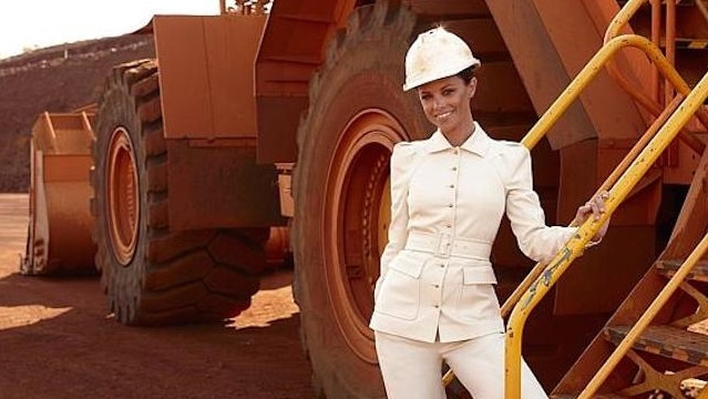 Bianca Rinehart in the Pilbara in a white Gucci suit. She has served a subpoena on Barnaby Joyce.