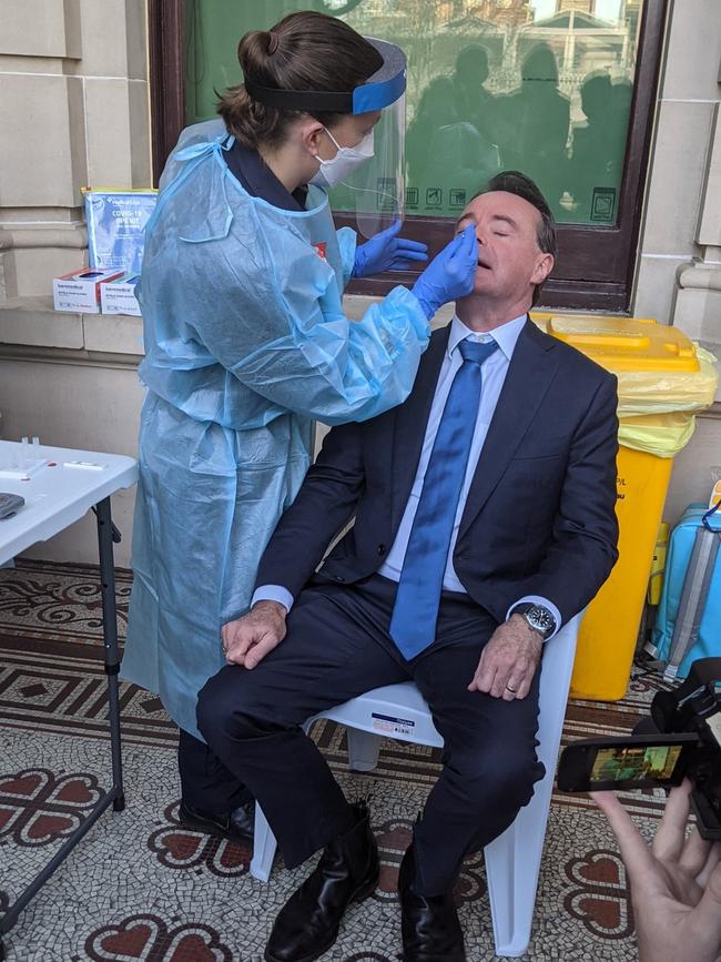 Former Opposition Leader Michael O’Brien gets a rapid Covid-19 test outside state parliament.