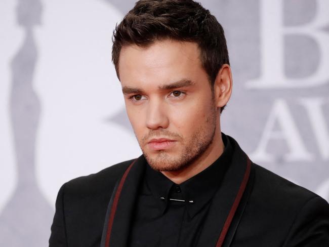 (FILES) British singer-songwriter Liam Payne poses on the red carpet on arrival for the BRIT Awards 2019 in London on February 20, 2019. British former One Direction star Liam Payne consumed cocaine, alcohol and a prescription antidepressant before falling to his death from a Buenos Aires hotel balcony, Argentine prosecutors said on November 7, 2024. (Photo by Tolga AKMEN / AFP)