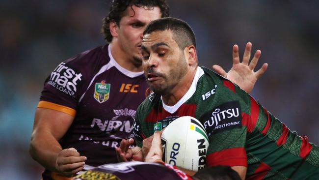 Greg Inglis gets crunched. (Matt King/Getty Images)