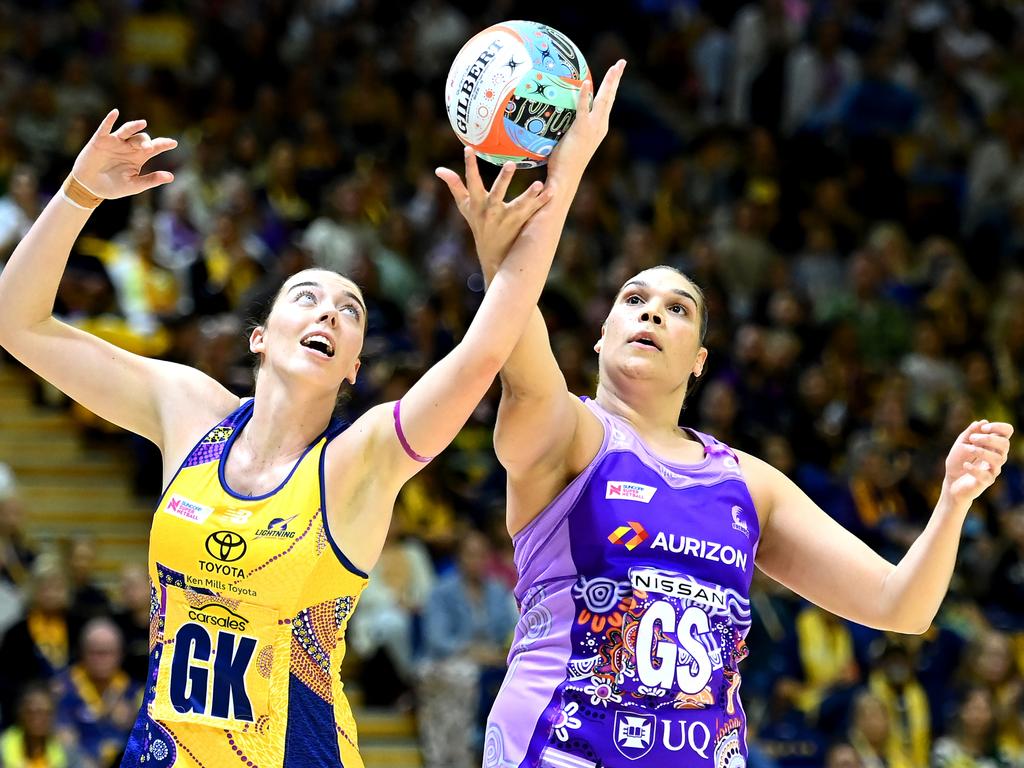 Lightning’s Ashleigh Ervin and Firebirds star Donnell Wallam contest possession. Picture: Getty Images