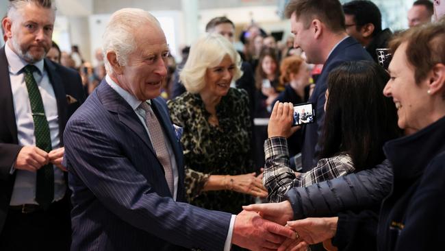 The King and Queen meet staff members as they arrive at the University College Hospital Macmillan Cancer Centre. Picture: Getty Images