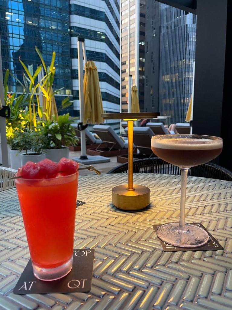 Cocktails at the QT's rooftop bar.