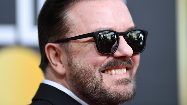 (FILES) In this file photo taken on January 5, 2020 British host Ricky Gervais arrives for the 77th annual Golden Globe Awards at The Beverly Hilton hotel in Beverly Hills, California. - From glitzy all-vegan galas to recycled red carpet outfits, Hollywood has stepped up efforts to reduce its carbon footprint this awards season, which will soon wrap up with the Oscars. But while some scientists have welcomed A-listers' renewed zeal on climate change, others have questioned whether Tinseltown's jet-set elite are any sort of example to follow. (Photo by VALERIE MACON / AFP)