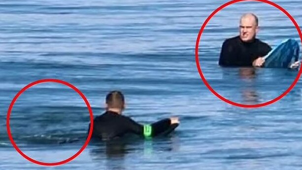 The photo shows a ripple in the water (left) moment before Tony Begg (right) was attacked by a shark. Picture: Nine