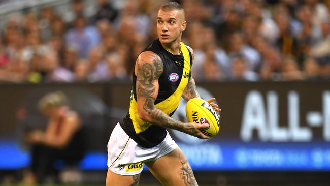 Dermott Brereton says Jeremy McGovern is more important than Tigers’ star Dustin Martin. Picture: AAP