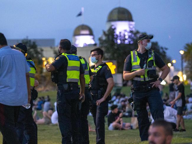 Pictures taken this evening at St Kilda beach of large crowds gathering.Picture by Wayne Taylor 15th November 2020