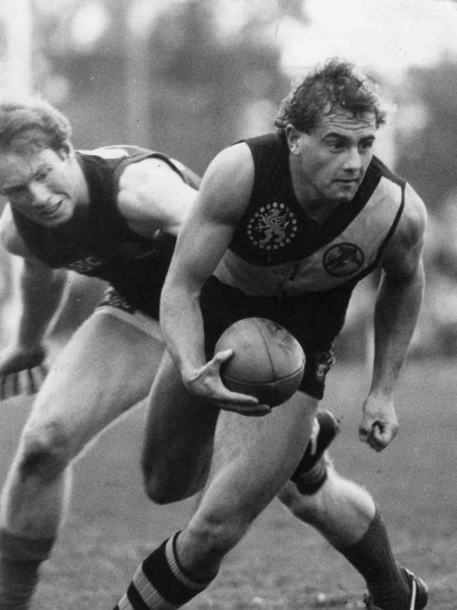 Ex-Glenelg, Footscray and Crows star Tony McGuinness, pictured in 1984, is a Brighton old scholar.