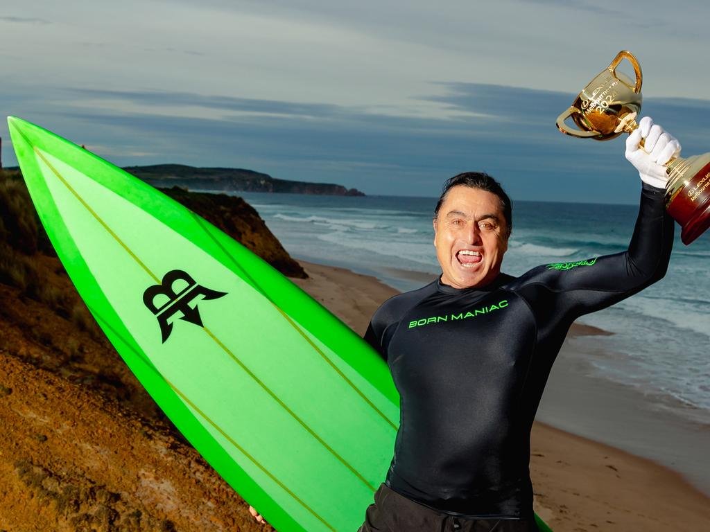 Big-wave surfer Ross Clarke-Jones with the trophy in Cowes on Phillip Island. Picture: Magner Media