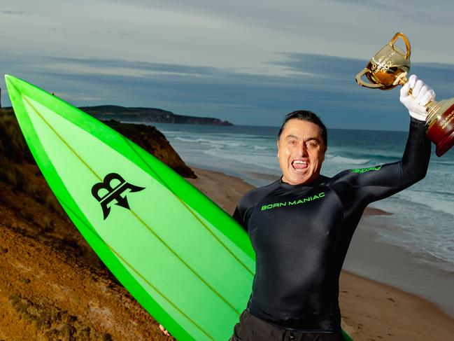 Big-wave surfer Ross Clarke-Jones with the trophy in Cowes on Phillip Island. Picture: Magner Media