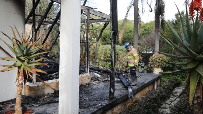 A fire investigator on scene after the house was destroyed in the blaze. Picture: Dean Martin/Advertiser