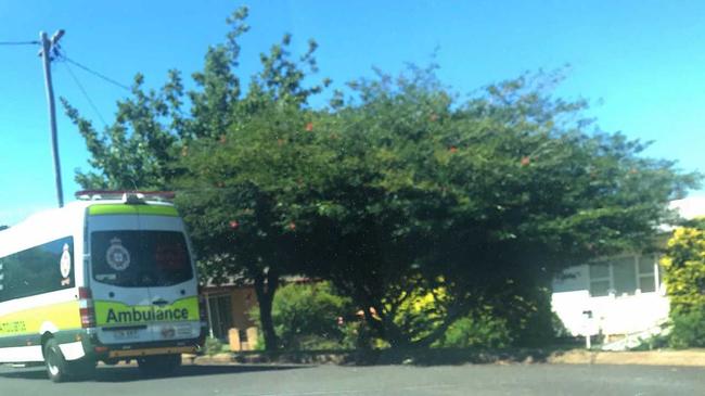 The ambulance out the front of Doris Symes house. . Picture: QAS