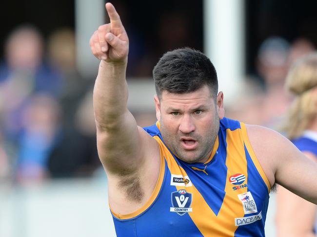 Cranbourne full-forward Marc Holt needing one goal to reach 1000 career goals took one minute of the first quarter to reach the milestone. Holt celebrates another goal.  Picture: AAP/ Chris Eastman