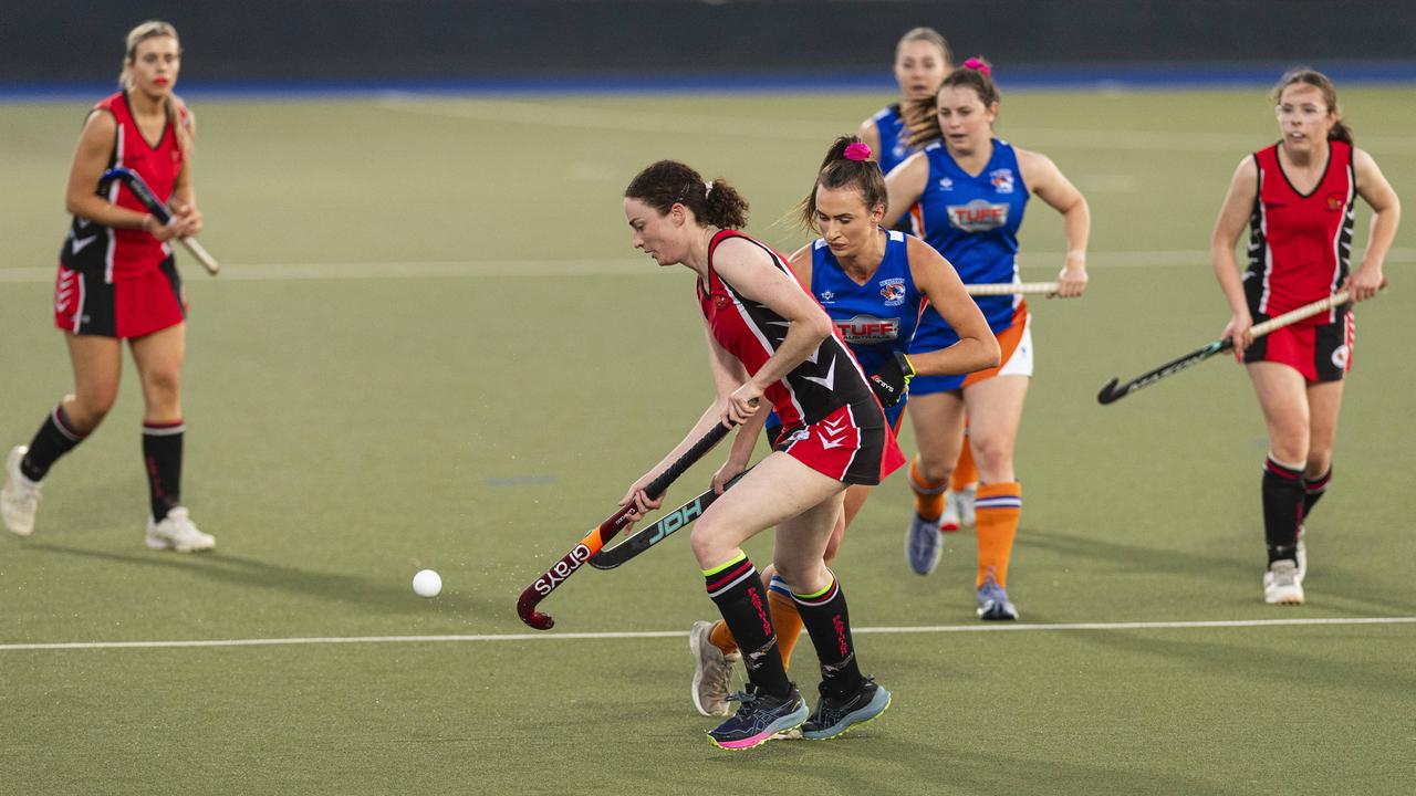 Rebecca Stark (left) of Past High and Torrie Thies of Newtown in A1 Women's Toowoomba Hockey grand final at Clyde Park, Saturday, September 7, 2024. Picture: Kevin Farmer