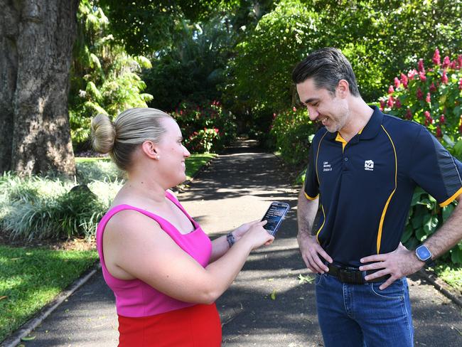 Townsville Enterprise Director, Lisa Woolfe shows Townsville City Councillor Liam Mooney shows off the new Livability Campaign ‘The Good Life’. Picture: Shae Beplate.